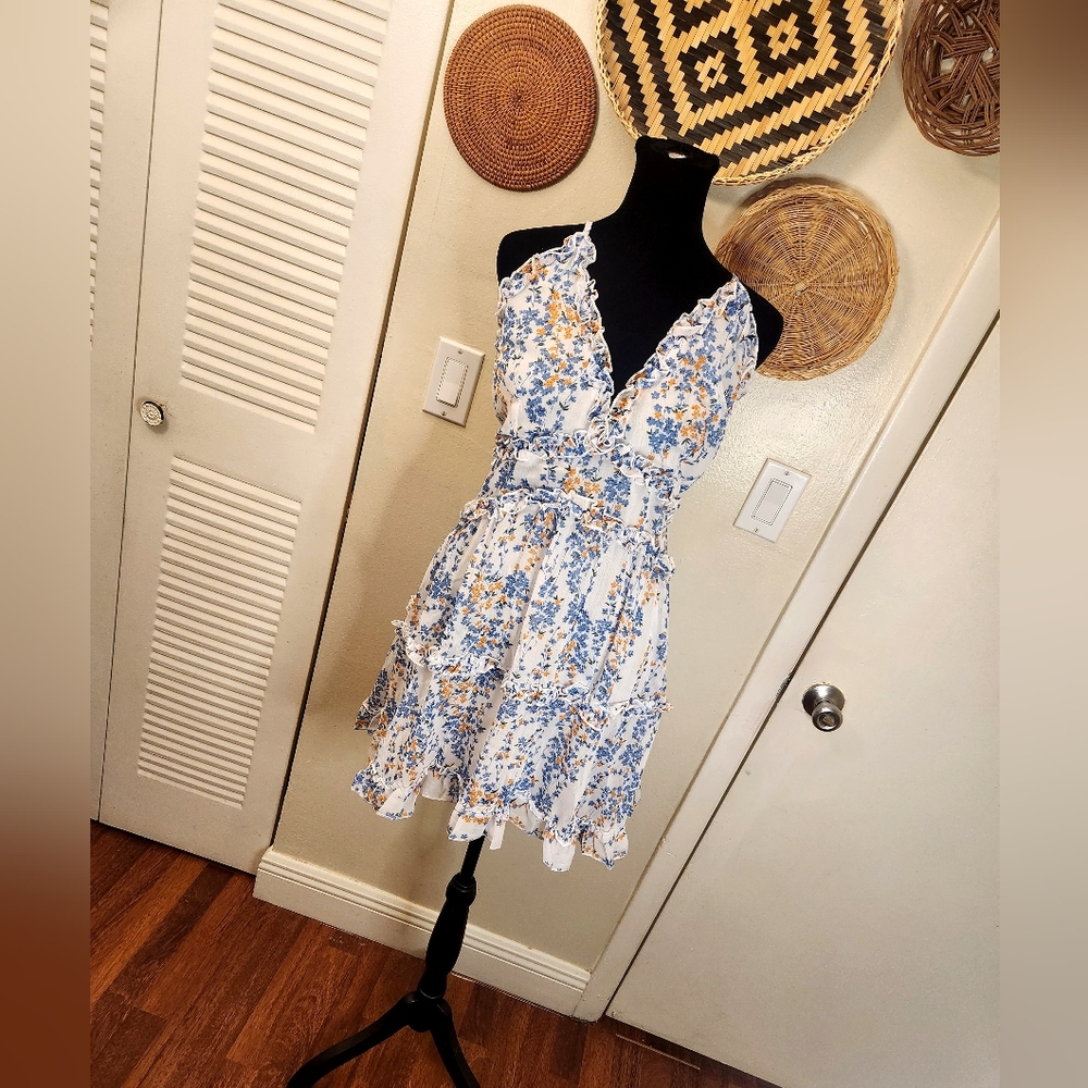LAST ONE! Blue And White Floral Mini Dress With Ruffles And Criss-Cross Back - Picture 3 of 11